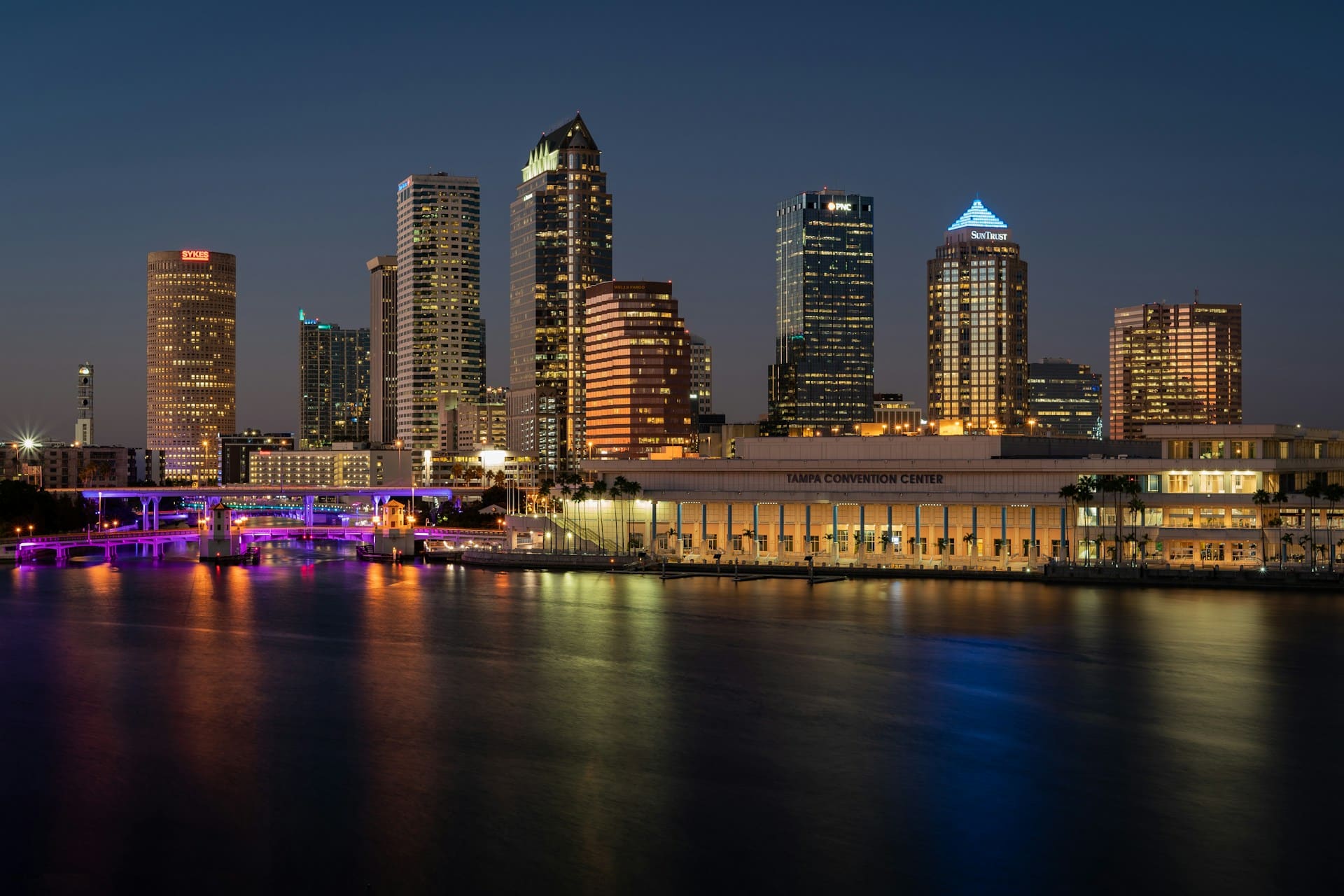 Photo by Kody Cheyne on Unsplash Tampa skyline over convention center